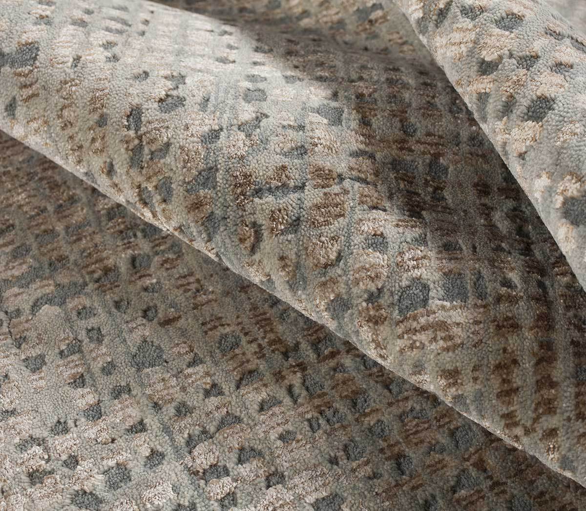 Detail shot of CHIAPAS ICE TAUPE, a hand knotted rug designed by Tufenkian Artisan Carpets.