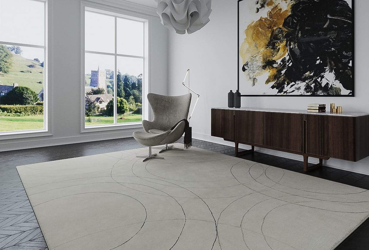 Installation shot of Cirque Pewter, a hand knotted rug designed by Tufenkian Artisan Carpets. room-image