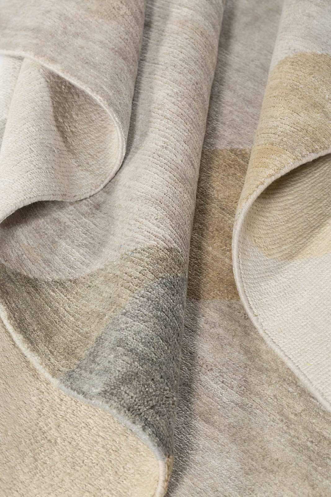 Detail shot of Delano Tan, a hand knotted rug by Tufenkian Artisan Carpets