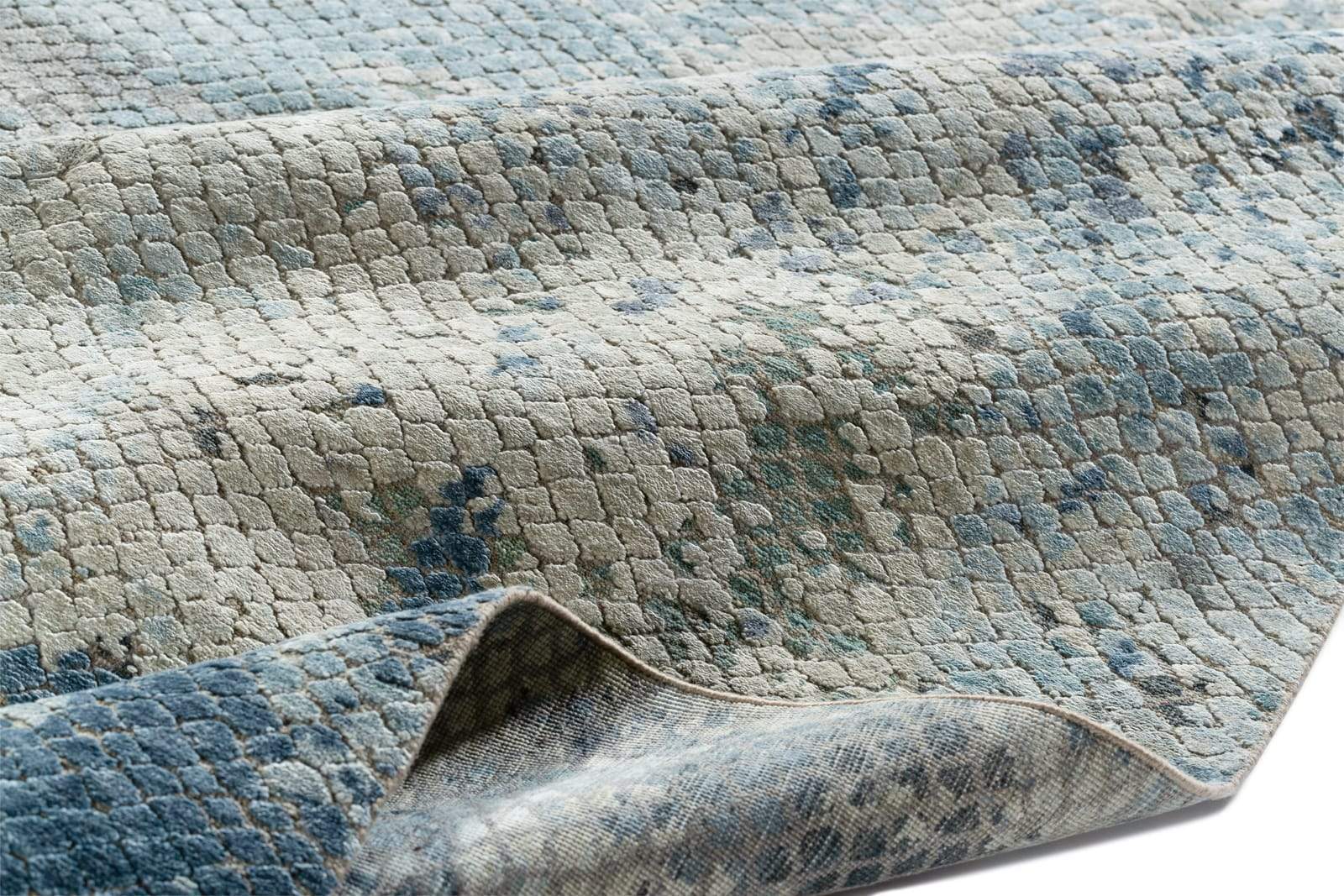 Detail shot of Foundry Cornflower, a hand knotted rug designed by Tufenkian Artisan Carpets.