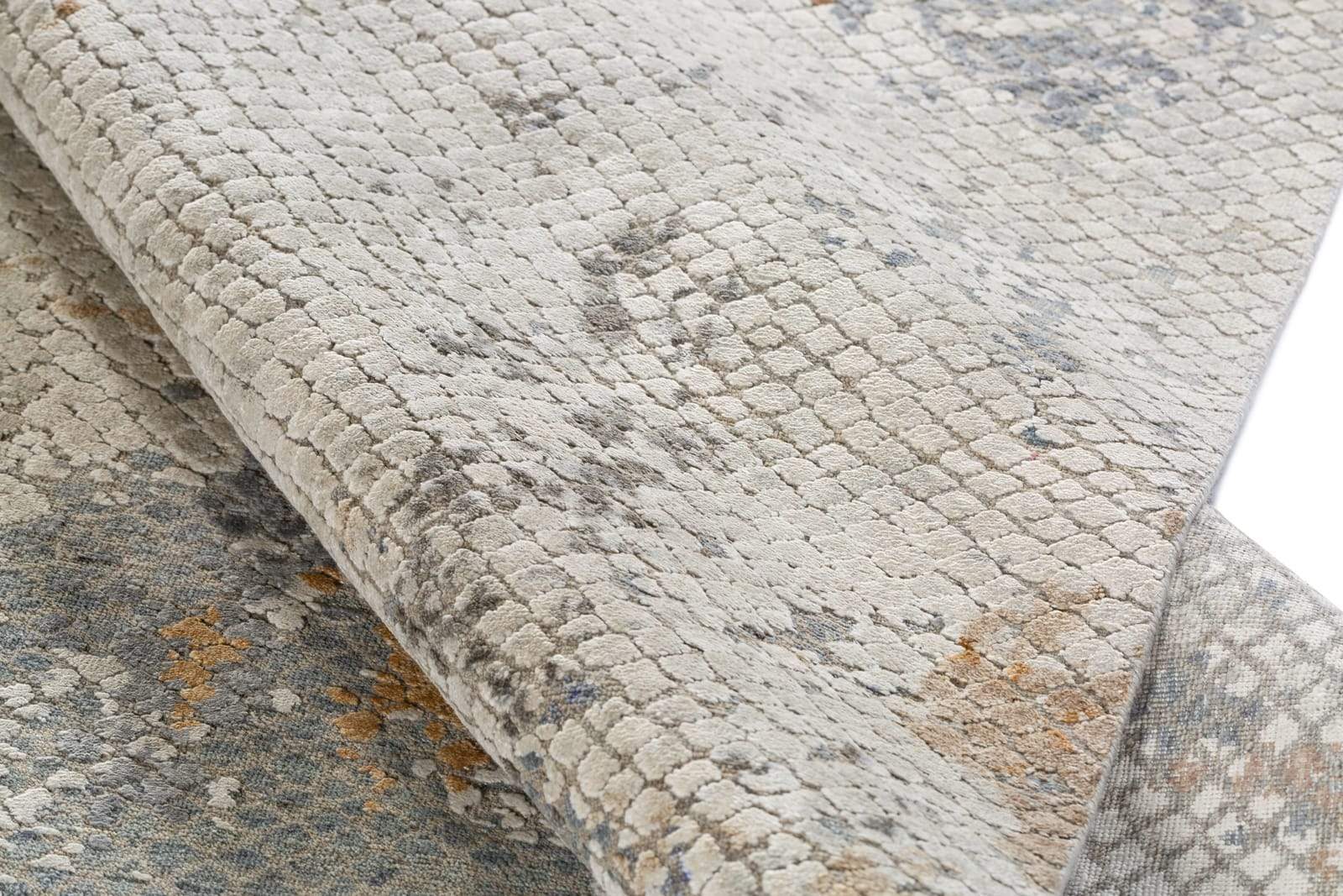 Detail shot of Foundry Travertine, a hand knotted rug designed by Tufenkian Artisan Carpets.