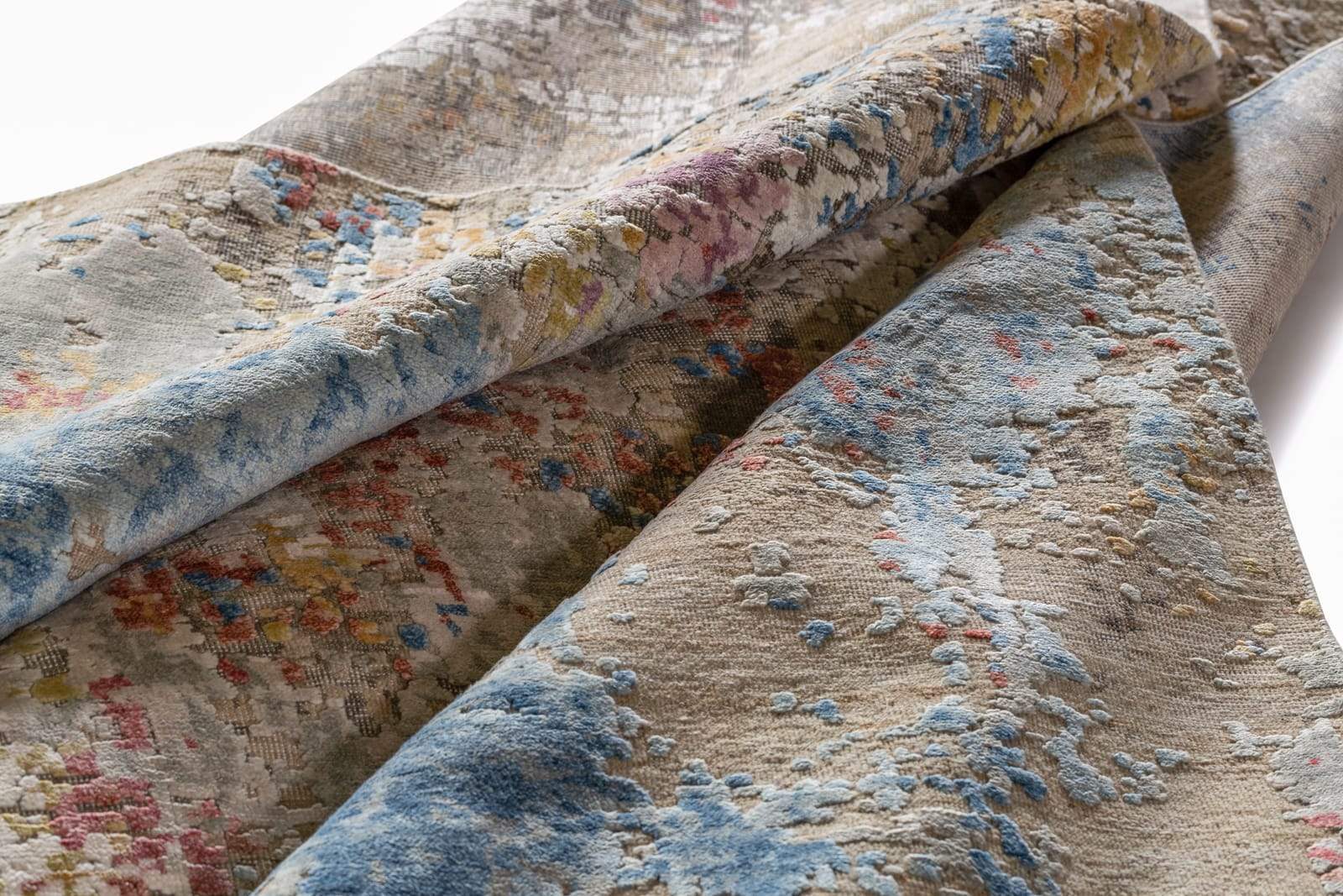 Detail shot of Frieze Confetti, a hand knotted rug designed by Tufenkian Artisan Carpets.