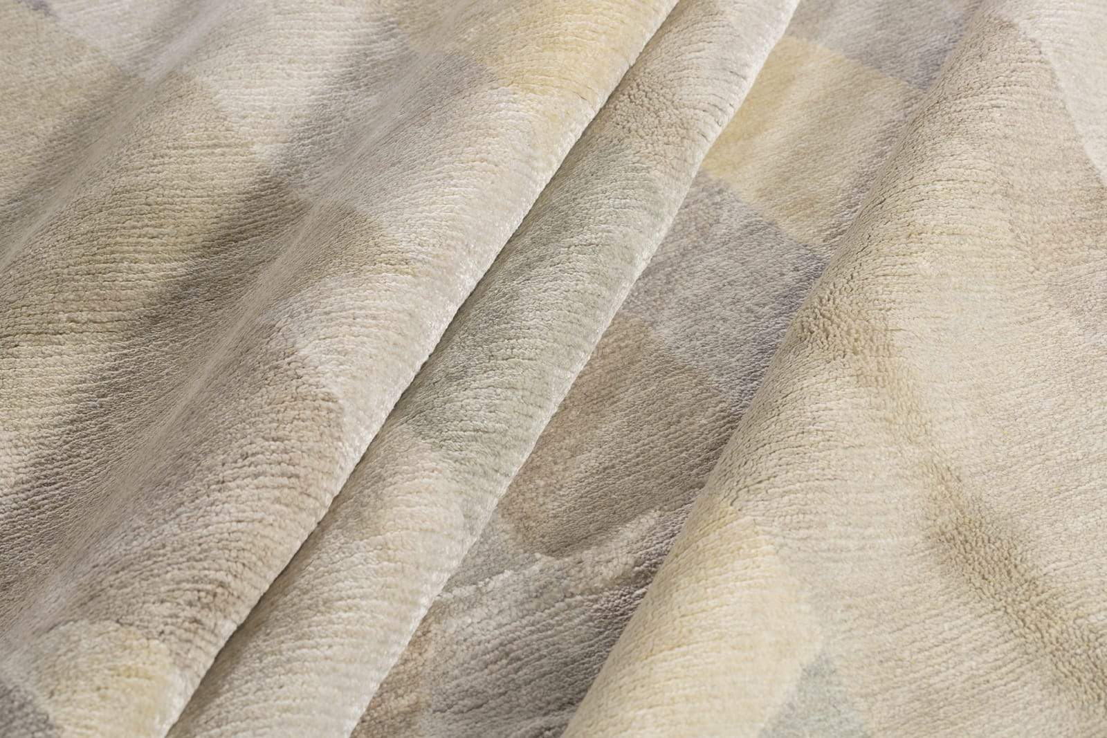 Detail shot of GILDED PASTEL, a hand knotted rug designed by Tufenkian Artisan Carpets.