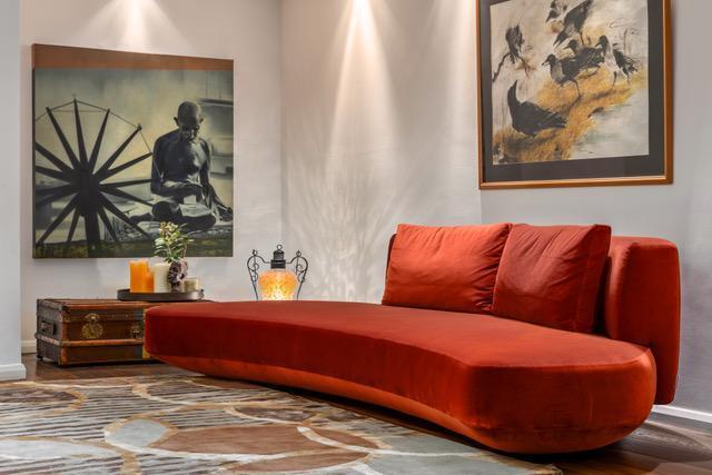 Installation shot of Ione Copper Penny, a hand knotted rug designed by Tufenkian Artisan Carpets. room-image