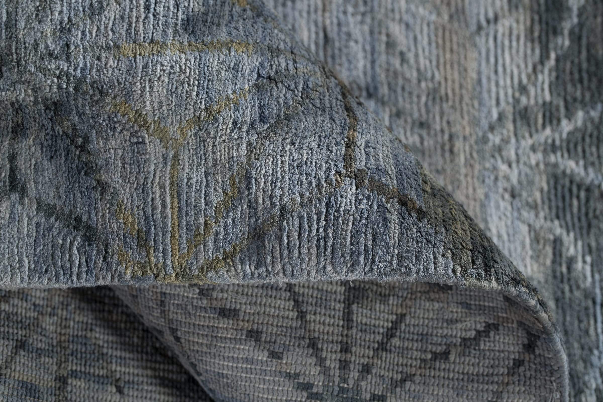 Detail shot of Kimono Dark Blue, a hand knotted rug designed by Tufenkian Artisan Carpets.