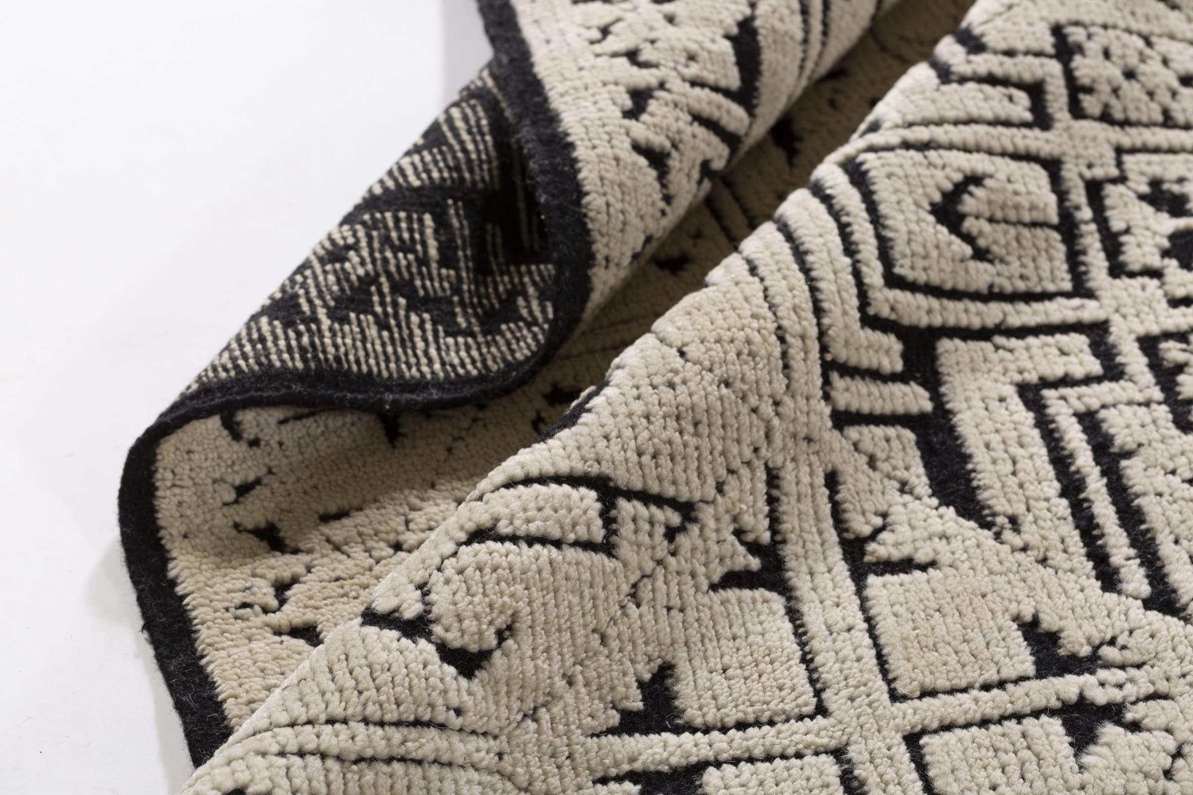 Detail shot of Mongol Beige, a hand knotted rug designed by Tufenkian Artisan Carpets.