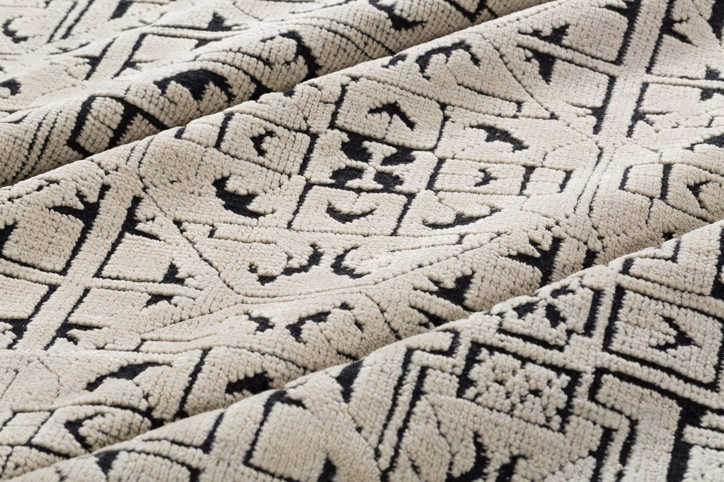 Detail shot of Mongol Beige, a hand knotted rug designed by Tufenkian Artisan Carpets.