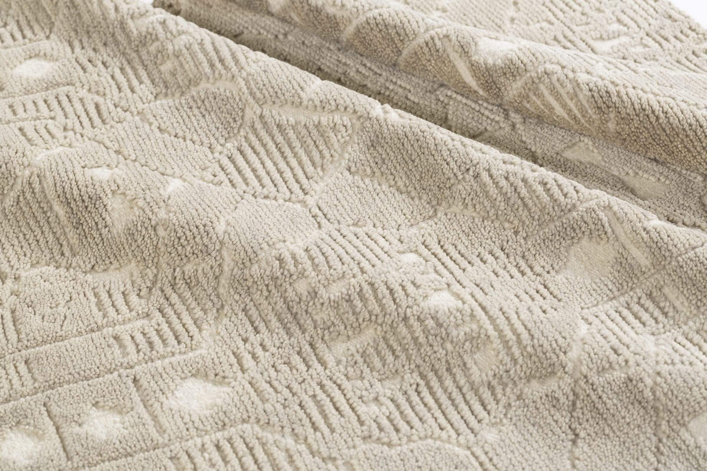 Detail shot of Monreale Light Taupe, a hand knotted rug designed by Tufenkian Artisan Carpets.