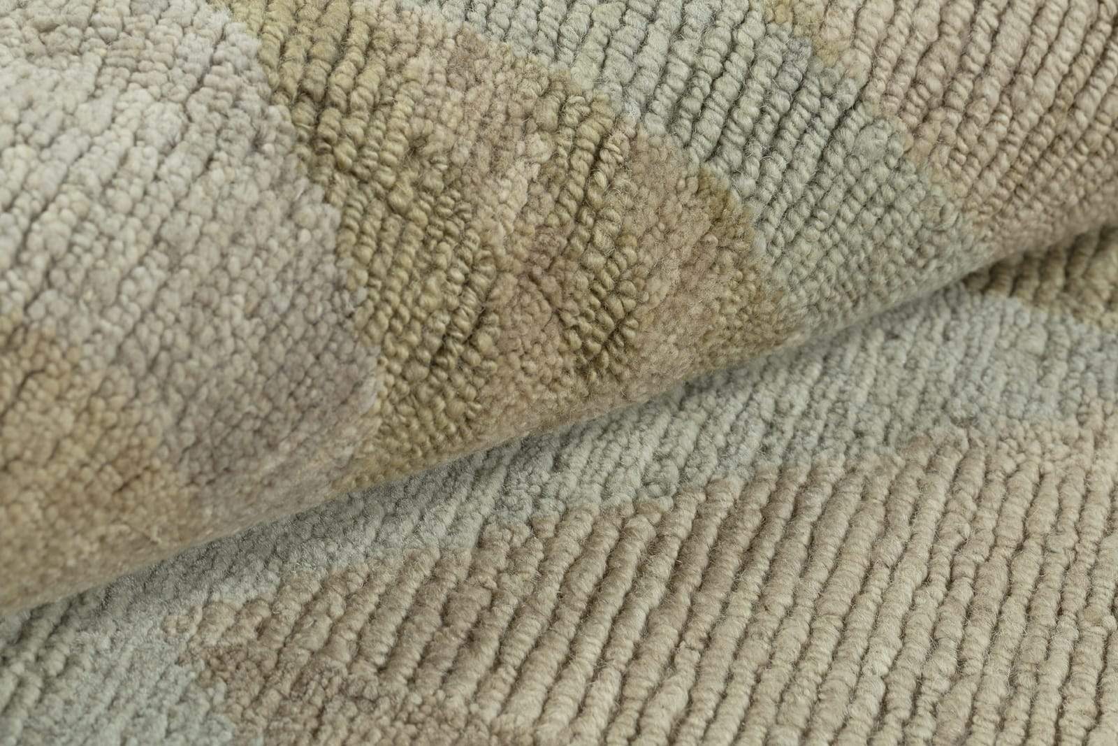 Detail shot of Malmo Soft Lichen, a hand knotted rug by Tufenkian Artisan Carpets