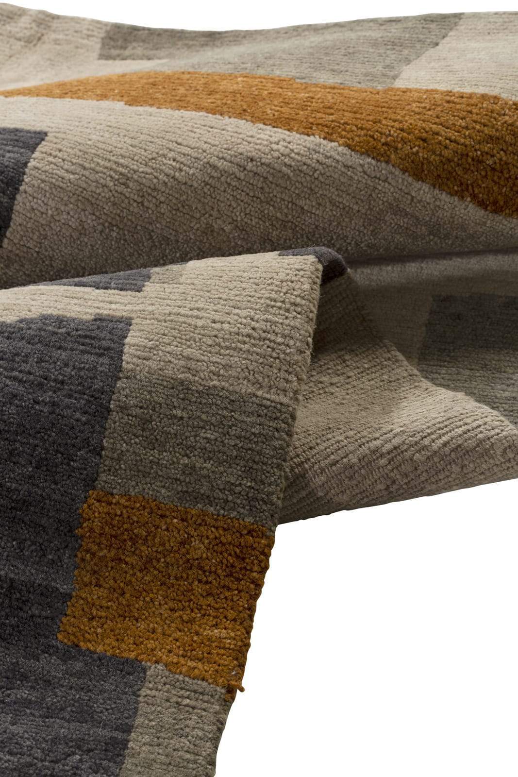 Detail shot of Marlowe II Taupe, a hand knotted rug by Tufenkian Artisan Carpets