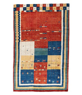 Persian gabbeh tajik is a 6x10 hand knotted rug 