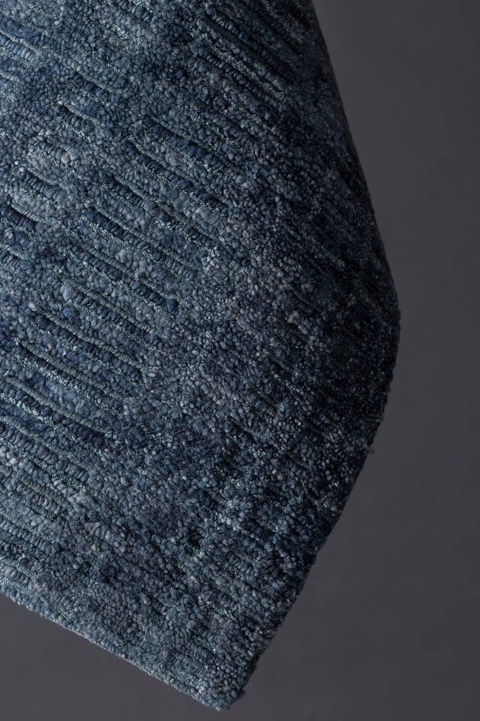 Detail shot of Rays II Blue, a hand knotted rug designed by Tufenkian Artisan Carpets.