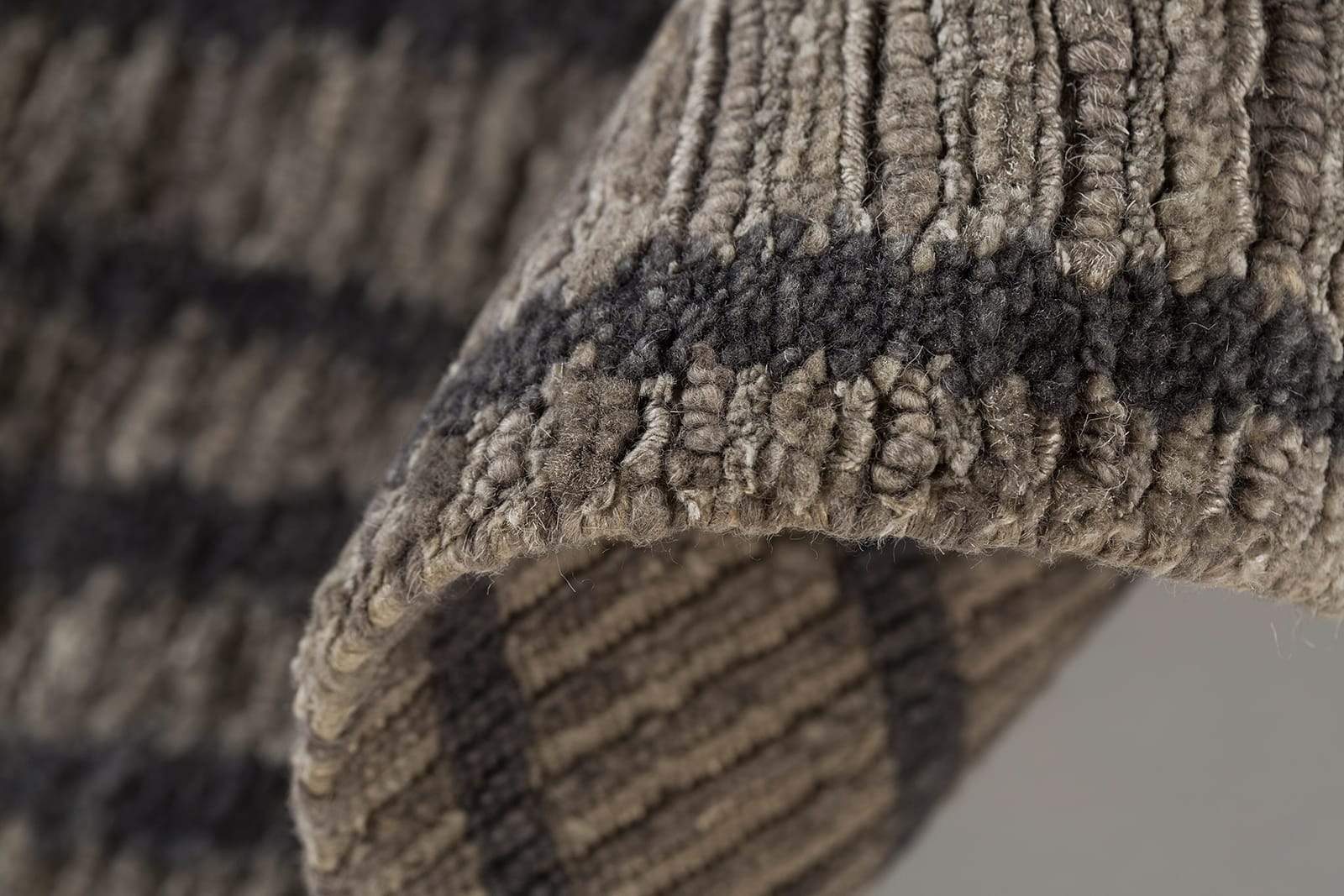 Detail shot of Rays II Bark, a hand knotted rug designed by Tufenkian Artisan Carpets.