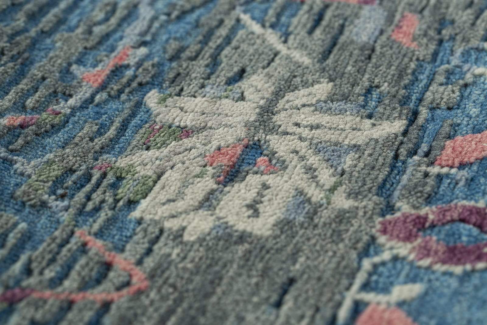 detail of Samarkand II Blue Rose, a hand knotted rug designed by Tufenkian Artisan Carpets.
