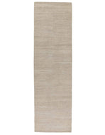 Solid Homespun Ivory, a hand knotted rug designed by Tufenkian Artisan Carpets.