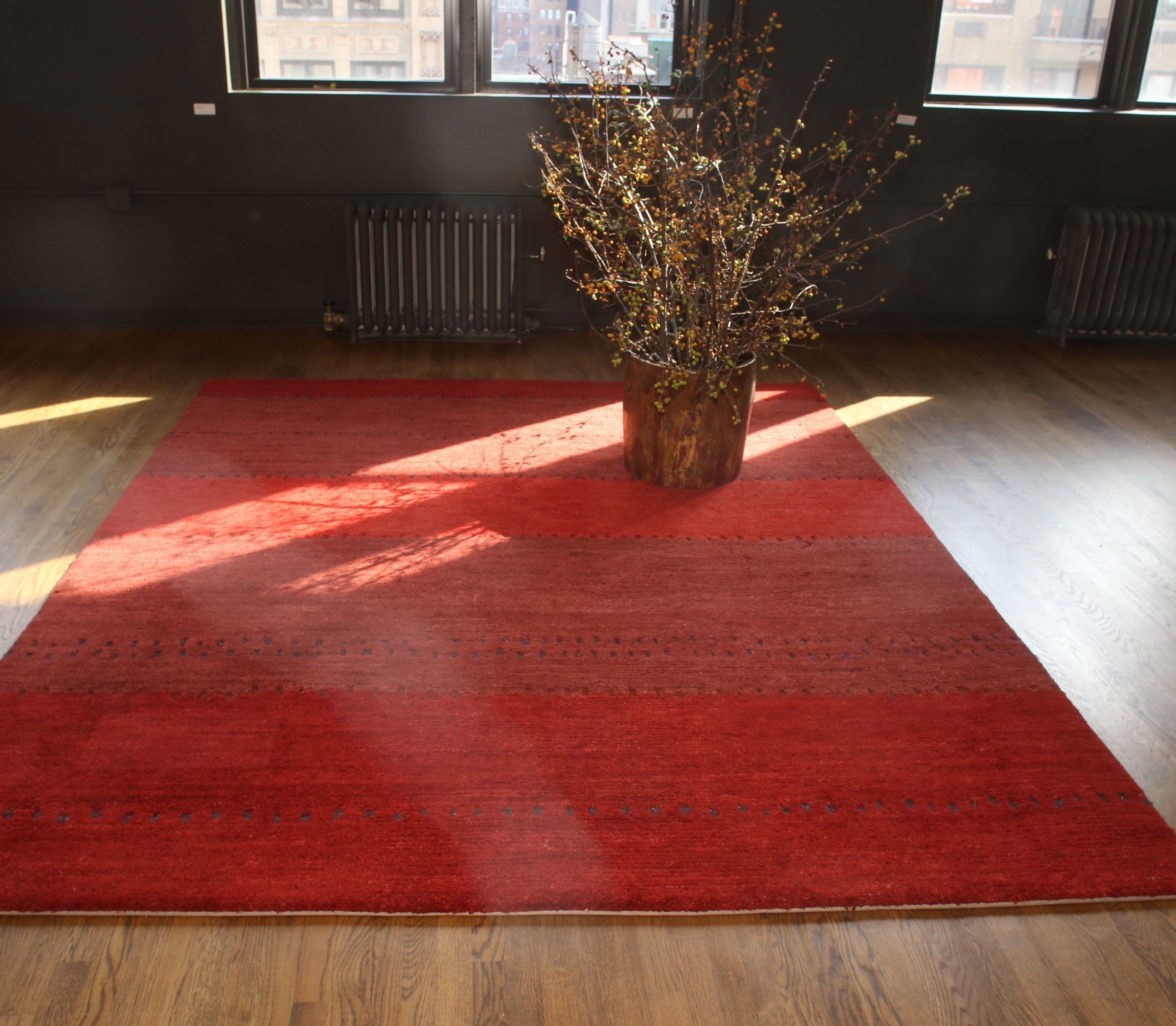 Installation of TAPEATS RHUBARB, a hand knotted rug designed by Tufenkian Artisan Carpets. room-image