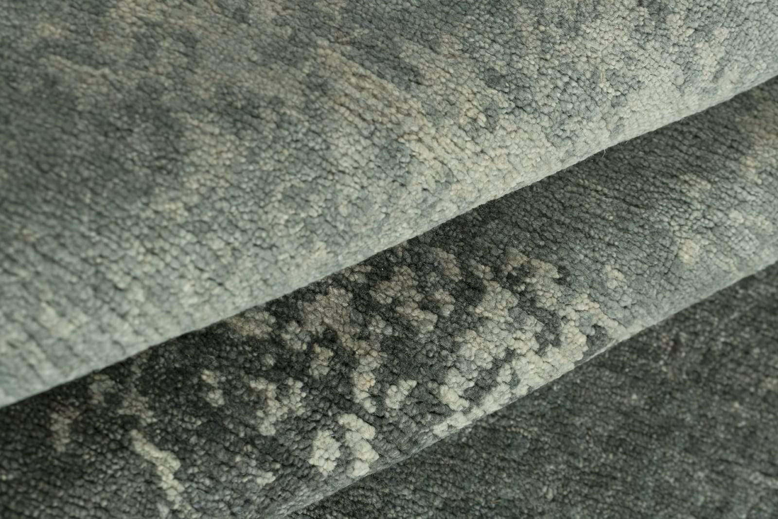 Detail shot of Watercolor Ocean Mist, a hand knotted rug designed by Tufenkian Artisan Carpets.